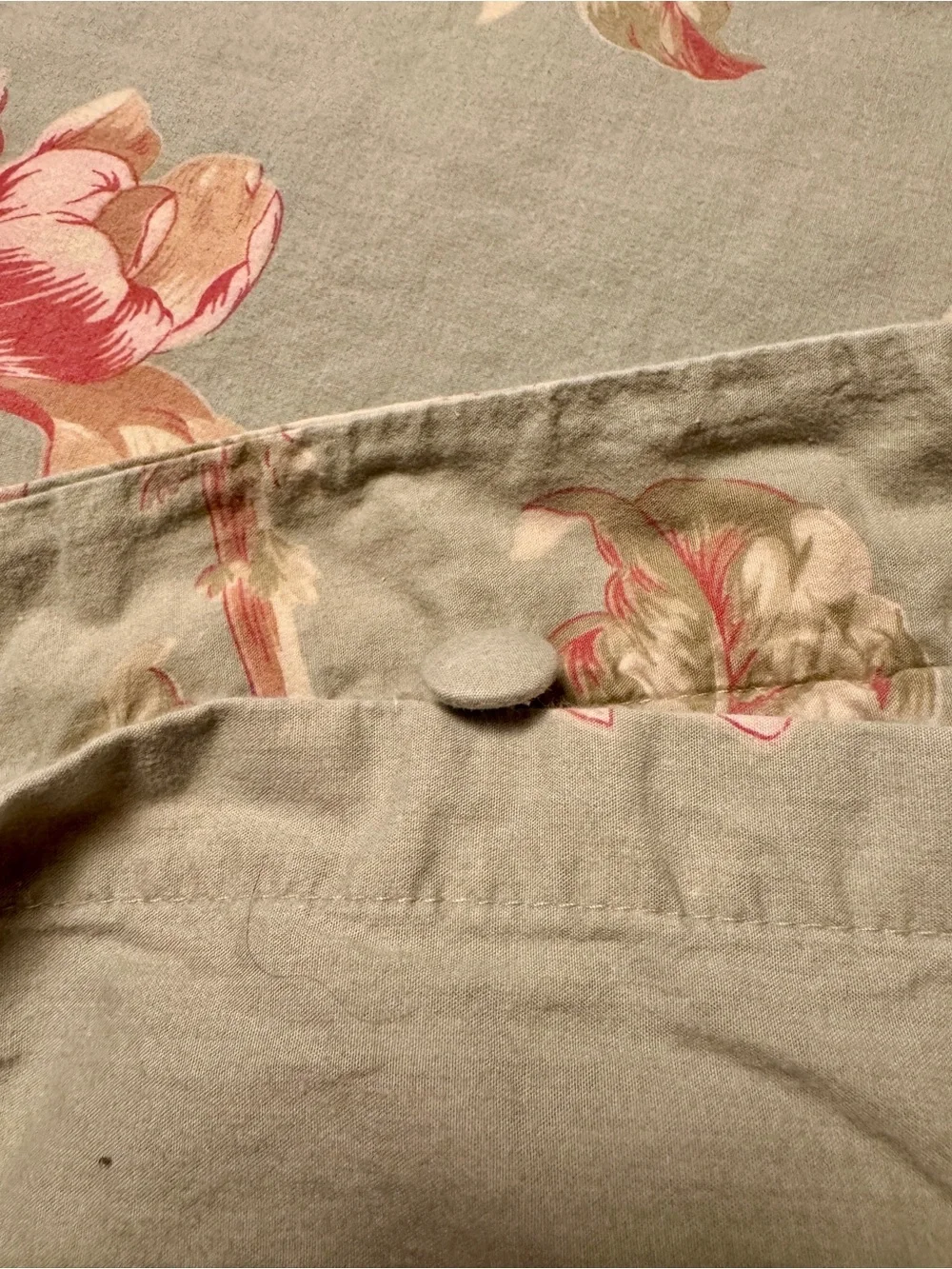 Floral Pastel Duvet Cover on a Light Moss Background with Pink-Coral Piping